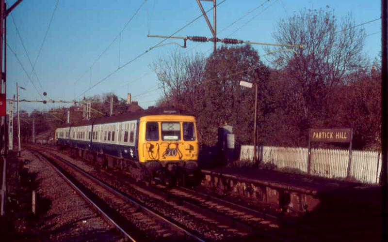 Stay of execution: As the new Partick station was still under construction in November 1979,Partick Hill to the west was granted a temporary reprieve.
303003 arrives on the first day of Argyle Line services Photo of Stay of execution