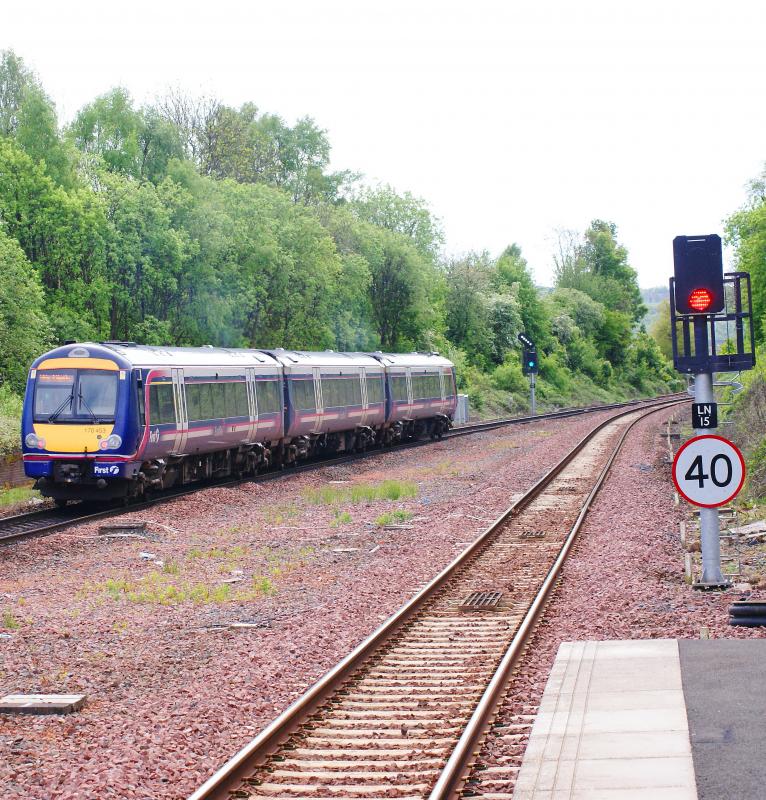 West-Bound from Larbert: After a five minute stop at Larbert , this DMU builds up speed. Photo of West-Bound from Larbert
