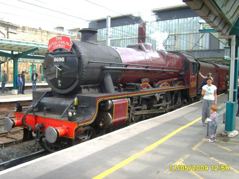 5690 at Carlisle: Leander gets an admiring look from a would be driver, or is it the bag of crisps he is more interested in !!!. Photo of 5690 at Carlisle