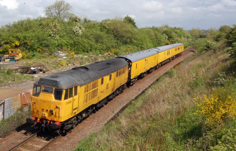 Push pull ped: 31233 shoves a test train past the old yard at Drybridge Photo of Push pull ped