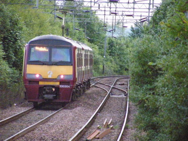320-304: Zooming past Bowling en-route to Helensburgh. Photo of 320-304