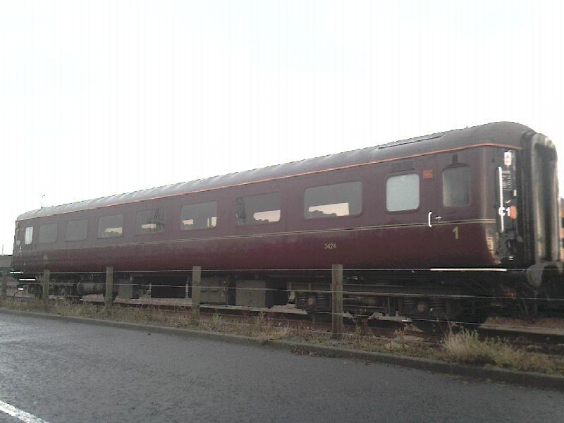 mk2 coach in mossend: on a trip to mossend i saw this ews mk2 coach sitting in the siding. 3424 is the id of the coach Photo of mk2 coach in mossend