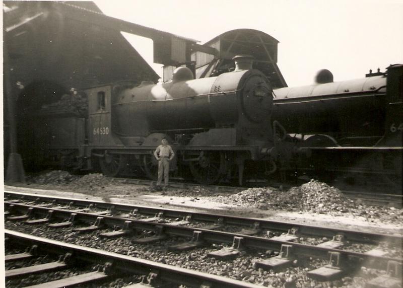 young railrobert: A young railrobert at Alloa engine sheds on a Sunday evening in the late 1950s helping his engine driver father steam up the engines. How time flies. Photo of young railrobert