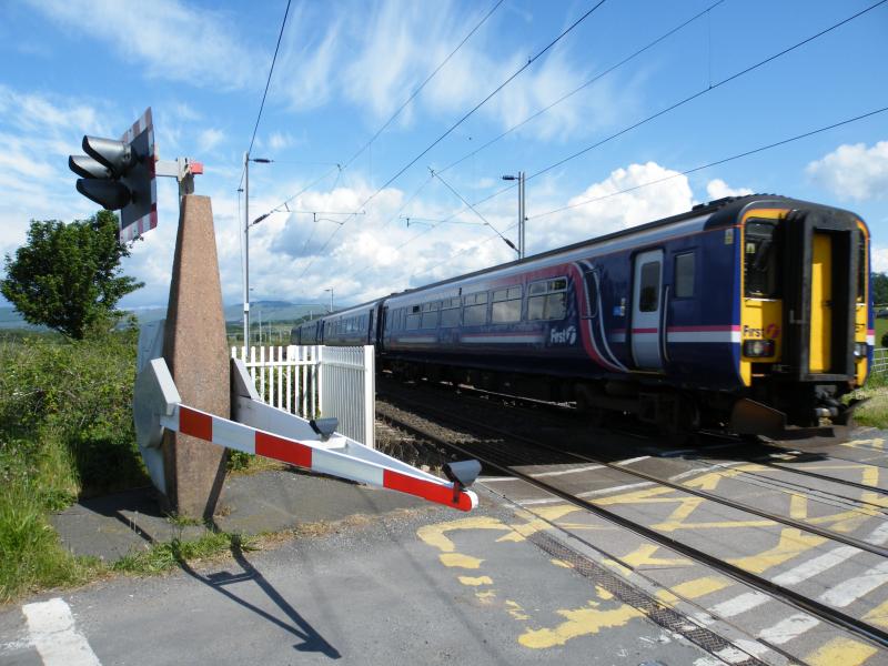 156-467 & 156-492: Passing a level crossing near Cardross Photo of 156-467 & 156-492
