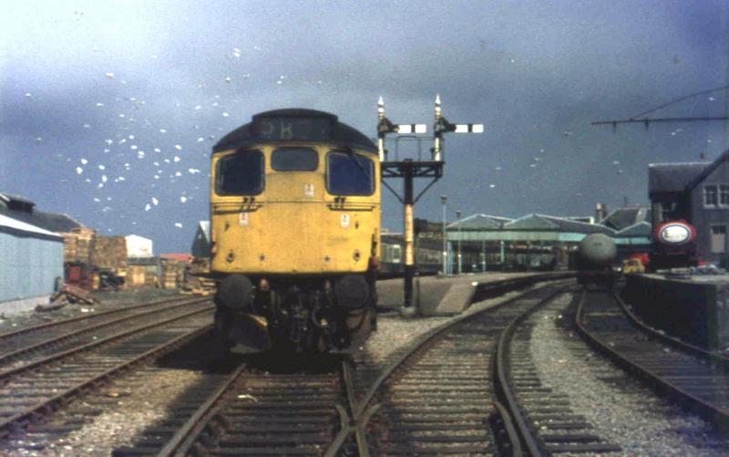 Mallaig in 1974: In the days when it still had a canopy, an engine shed and proper signalling - and the Fort William services still used the old station. Photo of Mallaig in 1974