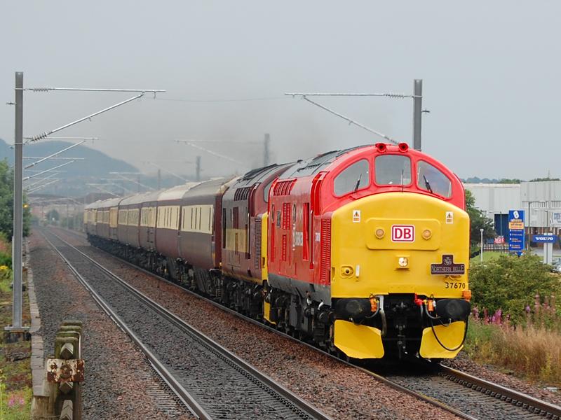 37670 + 37401 Northern Belle: 37670 in new DBS livery and 37401 head the Northern Belle through Edinburgh Park on 1Z24 0920 Edinburgh - Oban. Sunday 26/07/2009 Photo of 37670 + 37401 Northern Belle