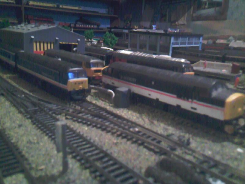 on shed: 37510 47016 and 47701 sit on shed Photo of on shed