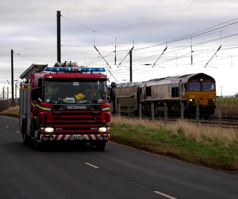Drem fire: Drem fire 30/01/07 . Retained Haddington Fire crew head back to base after a fairly serious early morning shout. 66115 in the background Photo of Drem fire