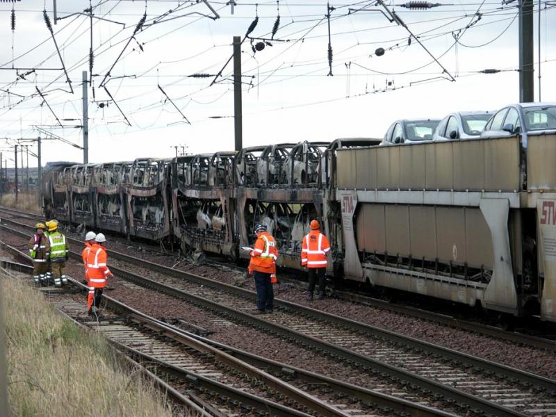 Drem fire 2: 36 new Honda cars destroyed , severe damage to the wagons and untold damage to track and overhear power lines. Photo of Drem fire 2