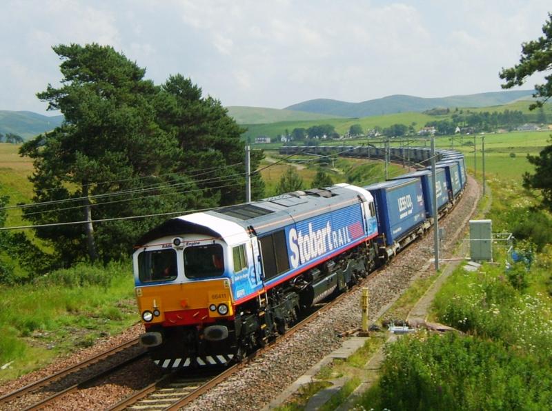Soon to be a Memory.: 66411, Eddie the Engine heads north on 25th July 2008 at Abington with the Tesco Exoress. Photo of Soon to be a Memory.