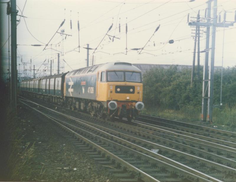 47 636 southbound TPO at Mossend Yard: 47 636 on a southbound TPO at Mossend Yard (mid 80's) Photo of 47 636 southbound TPO at Mossend Yard