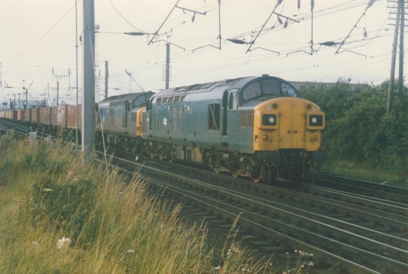 Southbound Freightliner at Mossend Yard: UID 37's head a southbound Freightliner out of Mossend Yard (mid 80's) Photo of Southbound Freightliner at Mossend Yard
