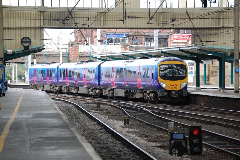 185 at Carlisle: An Edinburgh to Manchester Airport working enters Carlisle Photo of 185 at Carlisle