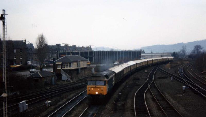 47448- Pullman luxury: In December 1987 the VSOE stock made some runs over a period of days on Lunch and Dinner excursions from Glasgow Central to Perth and return.
This is one of the return Lunch runs at Stirling North with 47448.
Photo of 47448- Pullman luxury