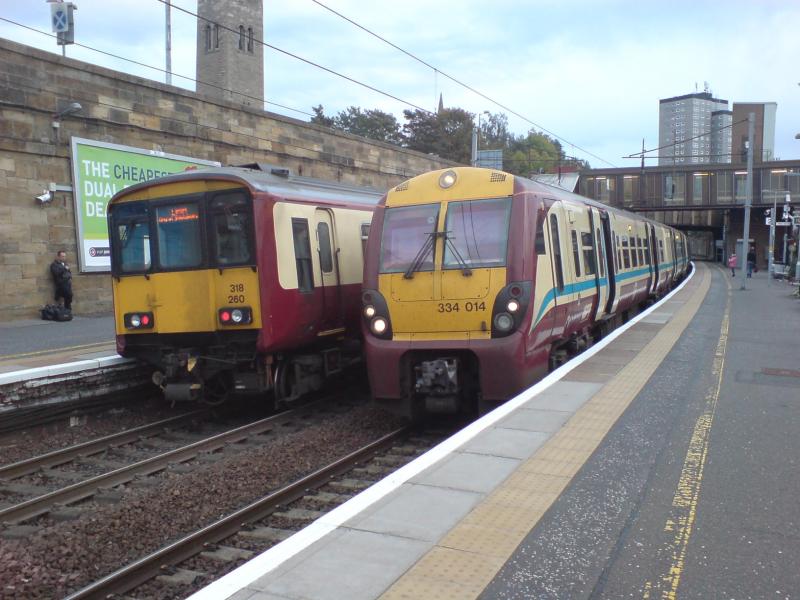 334 014 and 318 260 at Motherwell Station: 334 014 and 318 260 at Motherwell Station. (09.10.09) Photo of 334 014 and 318 260 at Motherwell Station