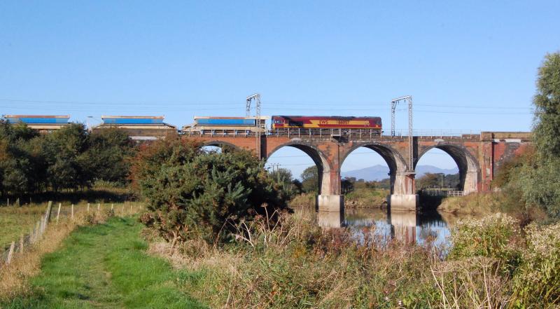 Crossing the Garnock: 6K30 Falkland to Barrhead engineers train crosses Longord viaduct south of Kilwinning on 13th Sep. Arrans hills can be seen through the arches Photo of Crossing the Garnock