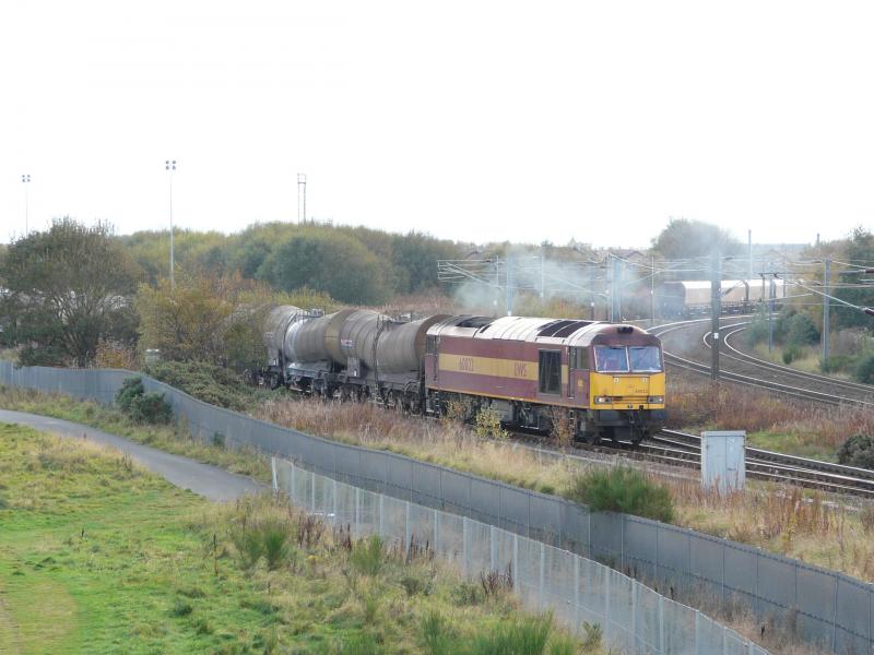 At last, 60022 departs Barassie Yard for Mossend: 60022 on 6D79 eventually sets off to Mossend from Barassie Yard after running round and awaiting a clear road at 16:15 on 22 October 2009. Photo of At last, 60022 departs Barassie Yard for Mossend