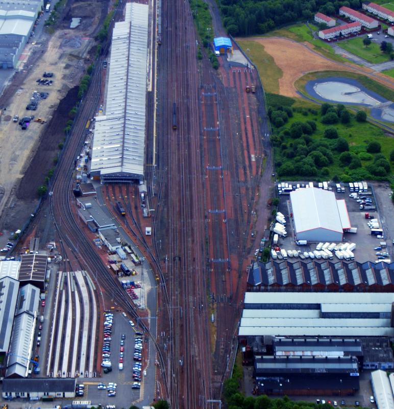 Polmadie depot : A view of a very empty Polmadie depot from the air and with the New M74 Interlink to the left hand side of the photo. ( Greig Gibson )
more photos at greiggibson.fotopic.net Photo of Polmadie depot