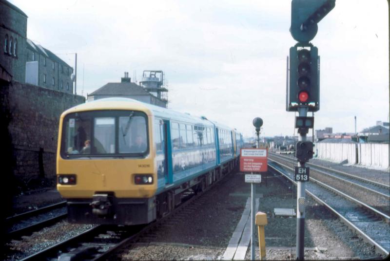 Pacing along: 143076 and friend forming the 1203 from Bathgate to Waverley arriving at Haymarket in April 1986. Photo of Pacing along