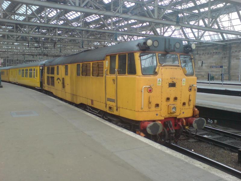 31 602 rests in Glasgow Central: 31 602 rests in Glasgow Central whilst working in and around Glasgow on a Network Rail test train.
(26-05-09) mobile phone picture. Photo of 31 602 rests in Glasgow Central