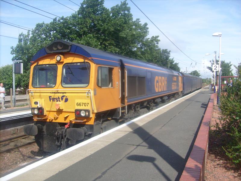 GBRf action at Barassie: GBRf 66707 plus 2 barriers on an ultra rare visit to Barassie, before doing a run round the stock and coming up the junction to Kilmarnock Brush Barclay. Photo of GBRf action at Barassie