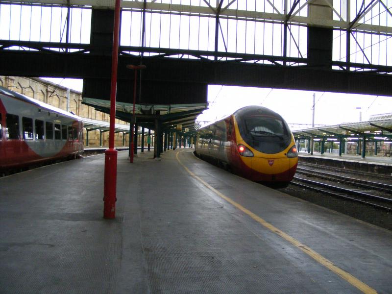 Carlisle on 25th August, 2007: Unidentified Virgin Trains service departs Southbound whilst a Northern Rail Class 158 sits in Platform 5. Photo of Carlisle on 25th August, 2007