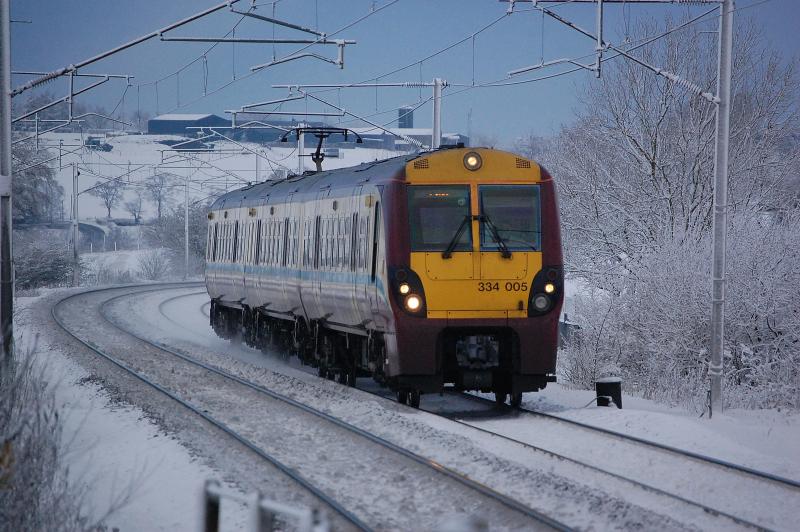More snow comin': as 334005 approaches Carluke with a Lanark bound train on Dec 22nd 09 Photo of More snow comin'