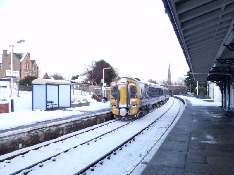 Train heading off: Train on its way to Wick. Photo of Train heading off