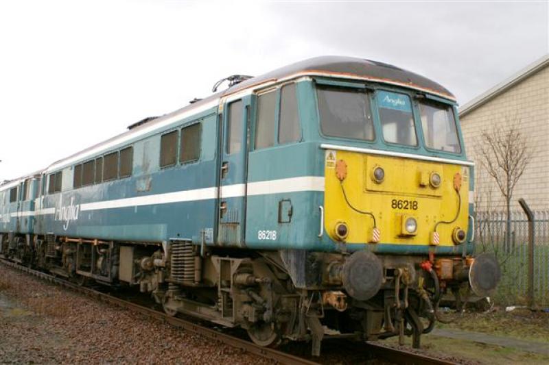 86218: 86218 stabled in the yard after arrival at Railcare Glasgow on the 22nd February 2007 Photo of 86218