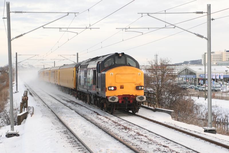 37s on 1Q10: 37610 and 37611 approach Edinburgh Park with NMT on 4 January 2010 Photo of 37s on 1Q10