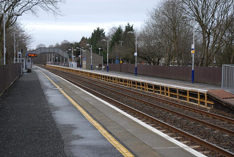 Lenzie Station - wooden supports: Lenzie Station - platform 1 - wooden supports in place after snow/ice damage. Photo of Lenzie Station - wooden supports