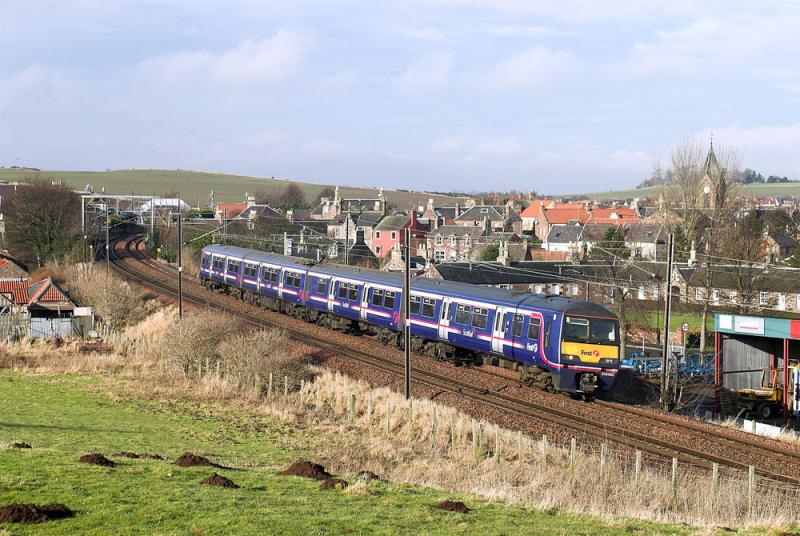 322482 passing East Linton: This will be a regular sight come May. A welcome spot of sun for the training run, 10.00 ex Waverley to Dunbar. 16 Feb 2010 Photo of 322482 passing East Linton