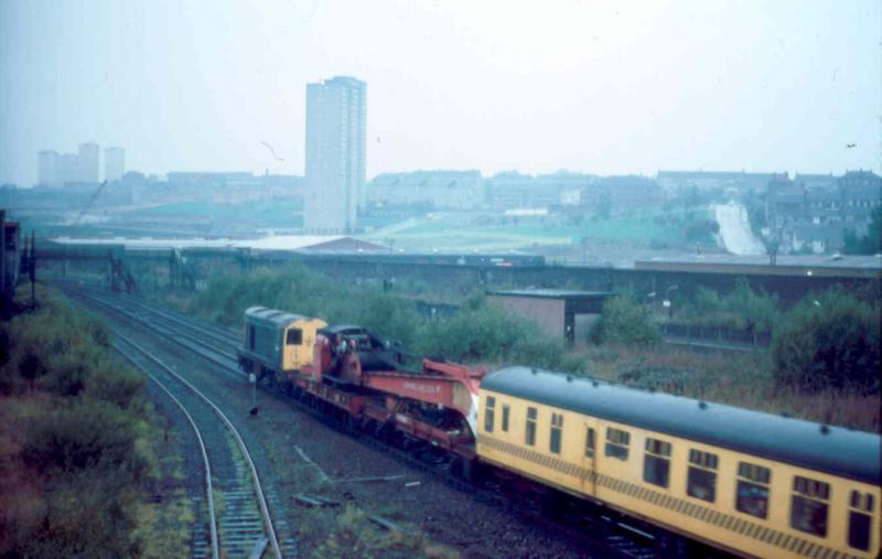 Back to the shed: 20118 at Barnhill in October 1983 with the Eastfield crane and toolvan returning after attending to a derailment at Cardowan. Photo of Back to the shed