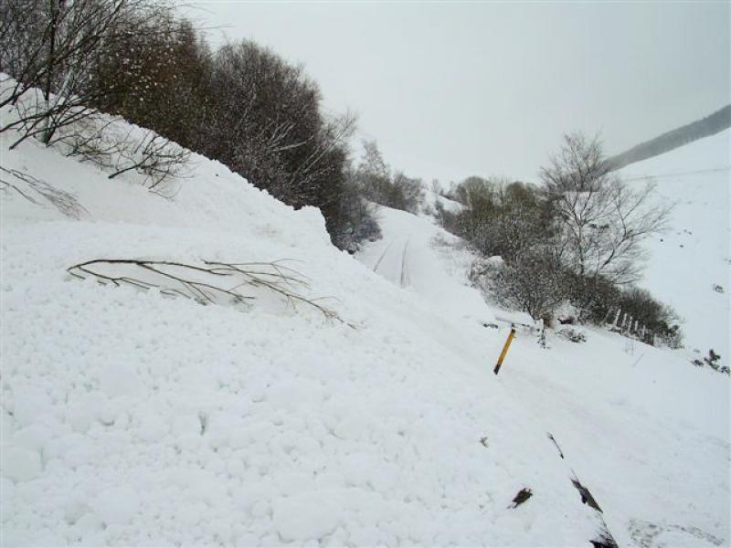 County March Avalanche: Standing on top of the 1st avalanche, a 2nd can be seen in the distance just a few yards further on. Photo of County March Avalanche