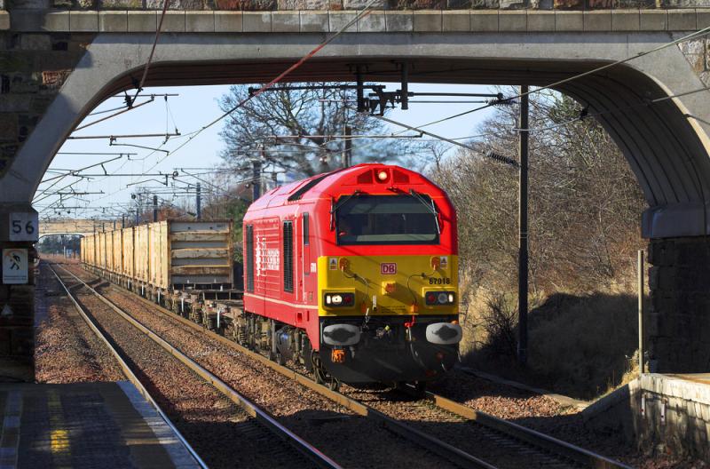 67018 and the Bins - 3: For a second day 67018 and sunny weather. 6B45 approaches Drem station with the loaded bins for Oxwellmains. 2 March 2010 Photo of 67018 and the Bins - 3
