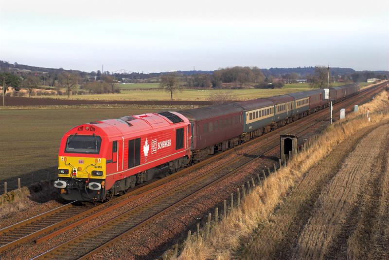 67018 brings up the rear at Park Farm: The brightness and cleanliness of 67018 does show up the cleaned stock somewhat. 5B24 Perth - Millerhill. 03 March 2010 Photo of 67018 brings up the rear at Park Farm