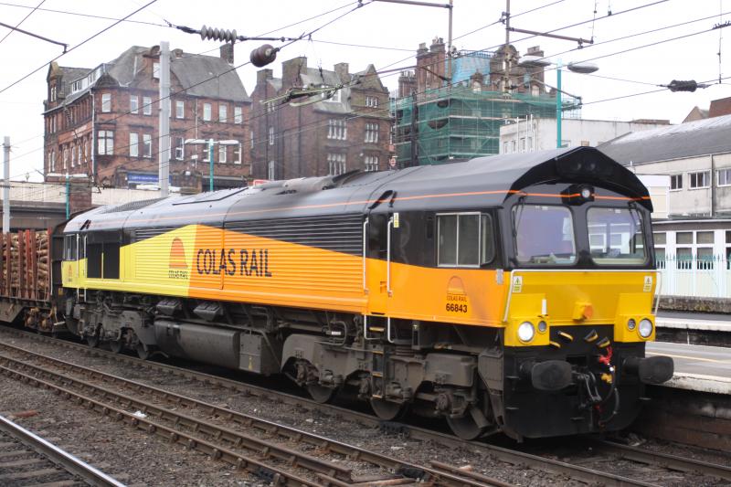 66843: 66843 runs through Carlisle Stn on the 3 March 2010 on the 6J37 Carlisle Yard to Chirk log train. Photo of 66843