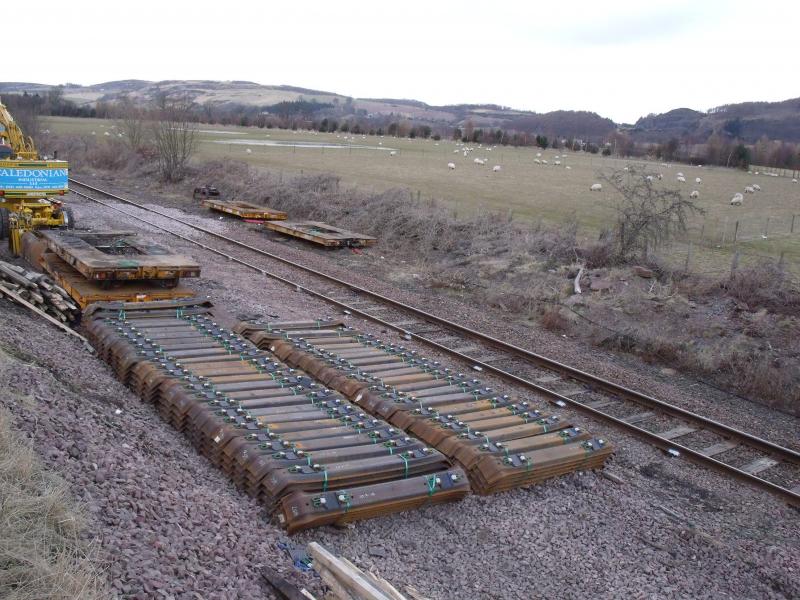 Metal Sleepers: Metal sleepers lie beside the track at Bridge of Earn Photo of Metal Sleepers