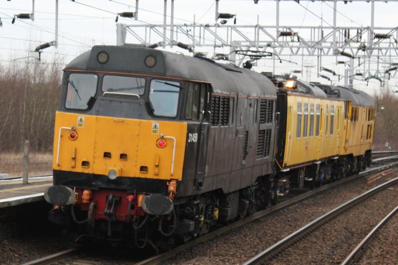 1Q18: 31285+31459 Leaving Motherwell 9:53 16/3/10 Photo of 1Q18