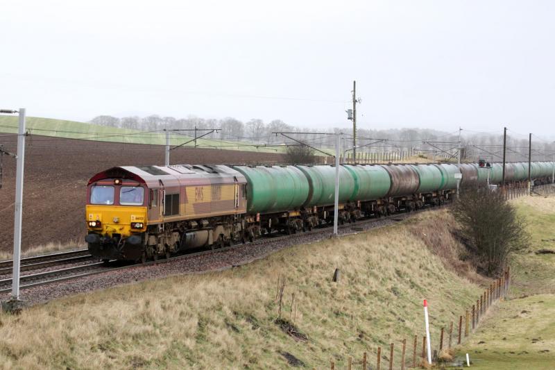 6s36: 66021 - Dalston - Grangemouth Passing Ravenstruther Sat 27/3/10 12:50 with empty bogie tanks Photo of 6s36