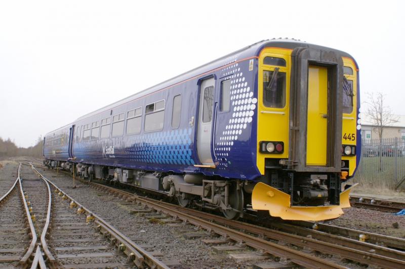 156445: 156445 stands in the yard at Railcare Springburn on the 31st March sporting the revised livery with the Gaelic translation of Scotland's Railway
With Permission of FirstScotrail & Railcare Photo of 156445