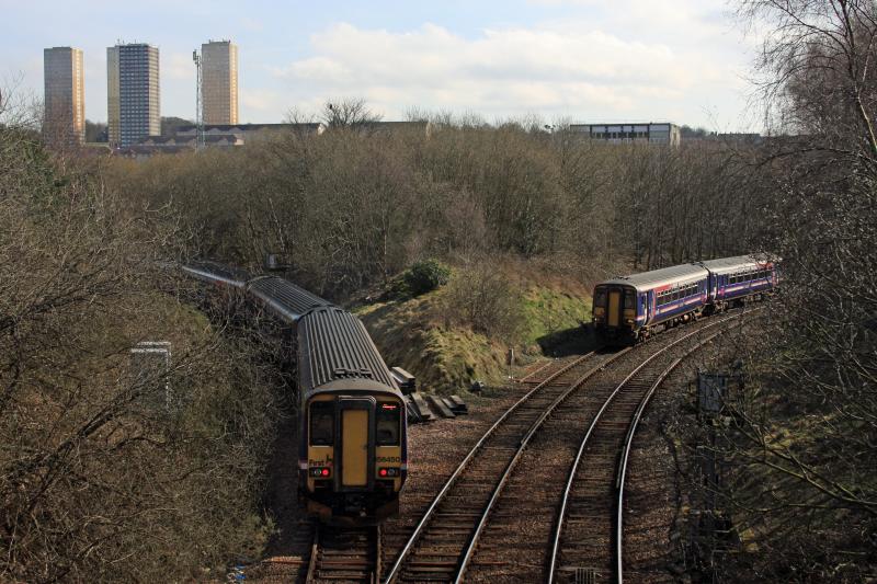 Cowlairs junction disruption: 156476 and 156450 on Oban/Mallaig-Glasgow take Cowlairs North-Cowalirs East curve (for reversal to Queen Street) while 156492 waits on Ashfield-Anniesland shuttle. 2/4/10 Photo of Cowlairs junction disruption