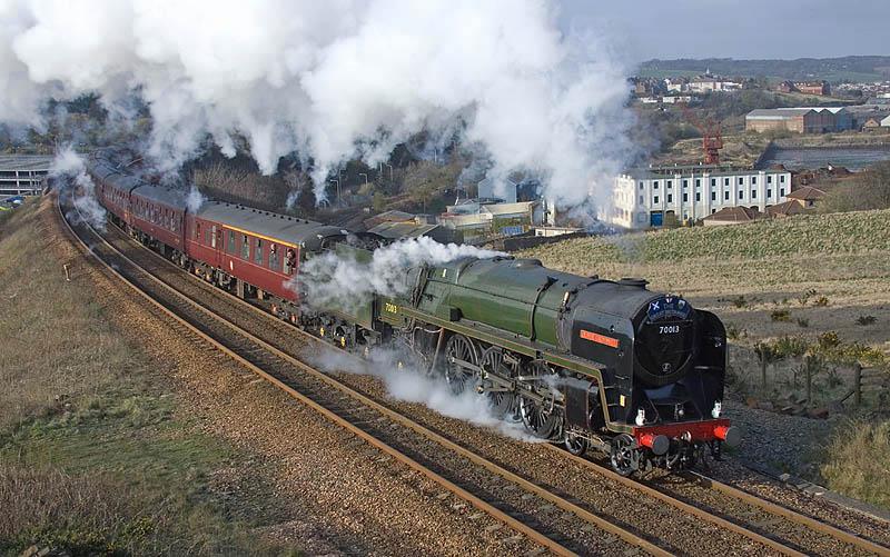 Oliver Cromwell at Inverkeithing: 70013 makes a spirited and noisy departure from Inverkeithing, having crossed Jamestown Viaduct on 13th April 2010. Photo of Oliver Cromwell at Inverkeithing