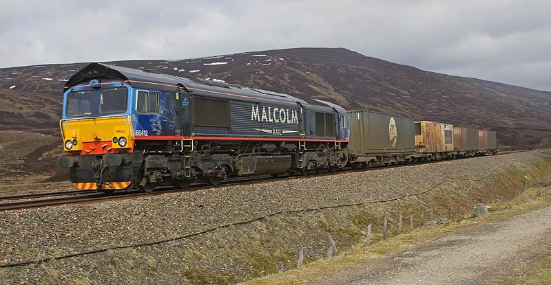 66412 near Balsporran: 66412 pictured on the morning of 13th April 2010 on the climb to the top of Drumochter, just south of Balsporran Cottages. Photo of 66412 near Balsporran