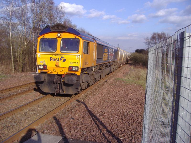 66705 at Gartcosh on the 6S44 to Ft.William: 66705 enters Gartcosh Station on the 6S44 North Blyth to Ft.William. (15.04.10) Photo of 66705 at Gartcosh on the 6S44 to Ft.William