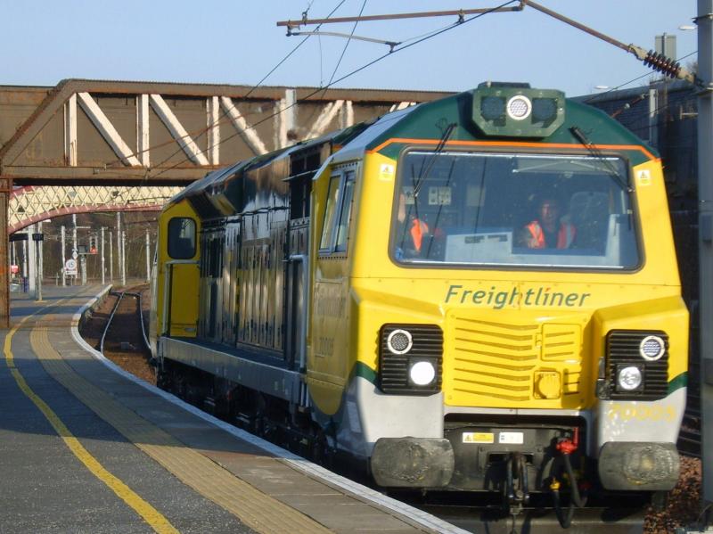 A first visit to Carstairs: 70005 on 0Z70 passes Carstairs on its way to Mossend prior to driver training. Photo of A first visit to Carstairs