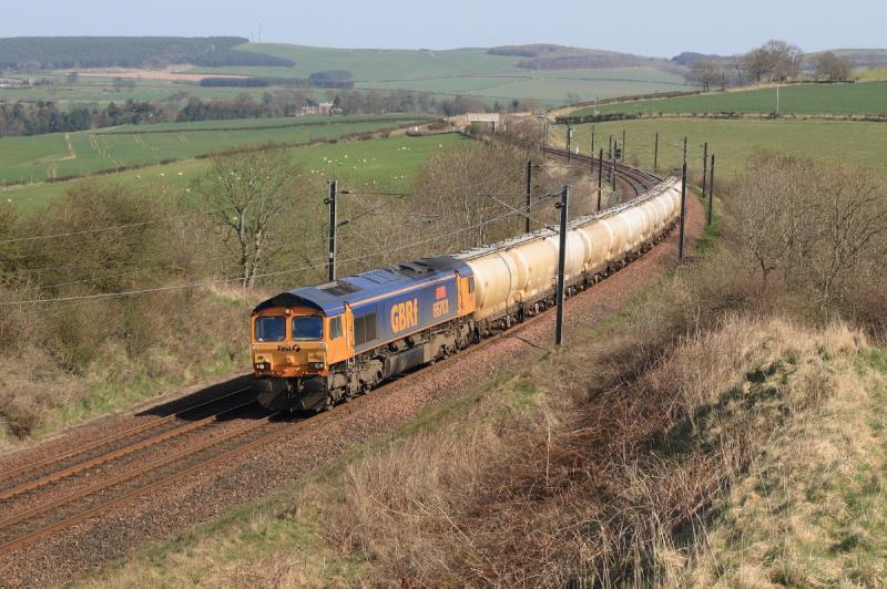 66703 on 6S44: 66703 passes MP 48.5 near Ayton on 6S44 North Blyth to Mossend on 16/04/2010. You could see trains leaving Burnmouth. Ayton is just over 1 mile north east. Photo of 66703 on 6S44