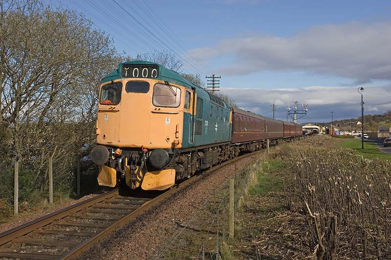 27001: Recent hard pruning of trackside vegetation, in this case dog roses, has created one or two reasonable new photo locations at Bo'ness. Here 27001 shunts empty coaching stock on 17th April 2010 ahead of the following days Forth Circle Railtour. Photo of 27001