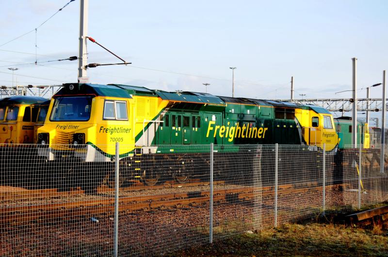 70005 On Mossend 2010-04-19 (0710am): 70005 sits in the early morning sun on Mossend Freightliner Holding sidings.
Arriverd from Doncaster presumed for trials Photo of 70005 On Mossend 2010-04-19 (0710am)