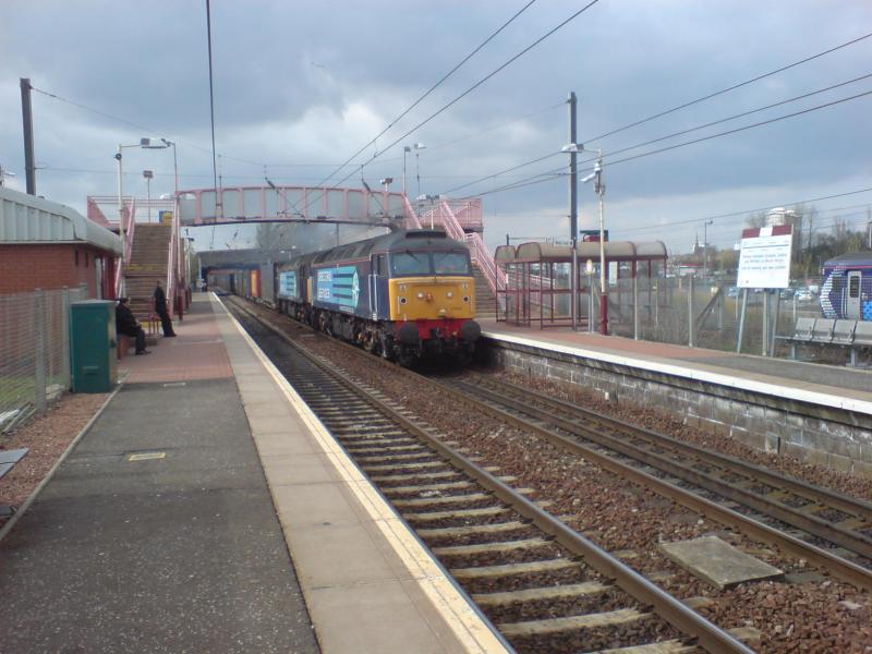 57009 & 003 power through Whifflet Station: 57009 & 003 power through Whifflet Station on the 4M82 Coatbridge to Daventry. (22.04.10) Photo of 57009 & 003 power through Whifflet Station